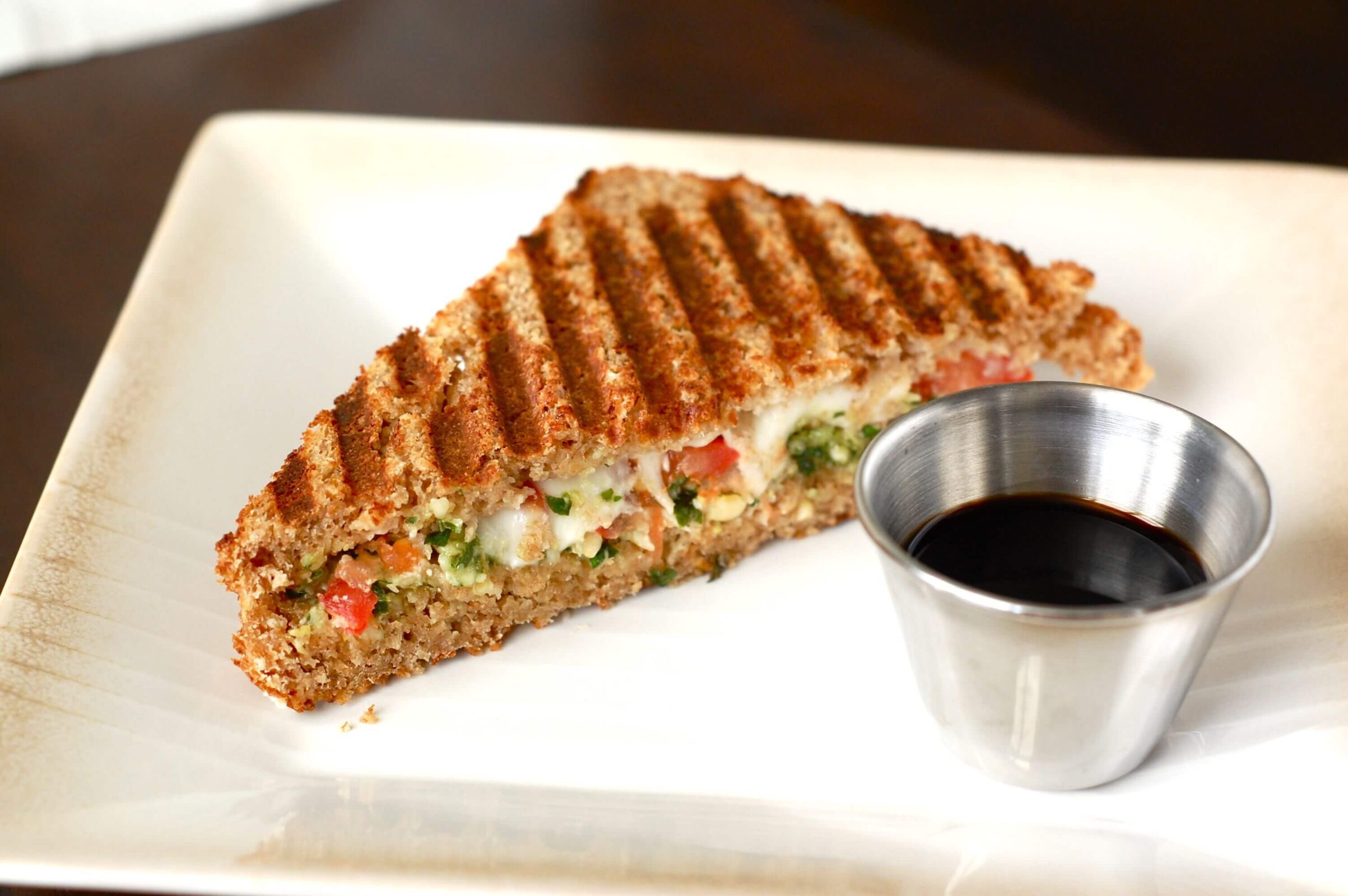 Grilled Caprese sandwich with balsamic vinegar. 