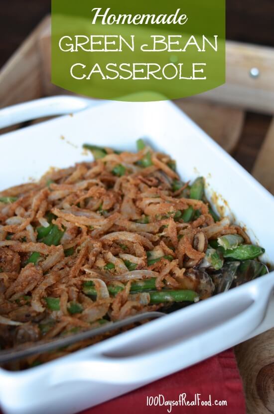 Homemade Green Bean Casserole topped with French onions in a white baking dish.