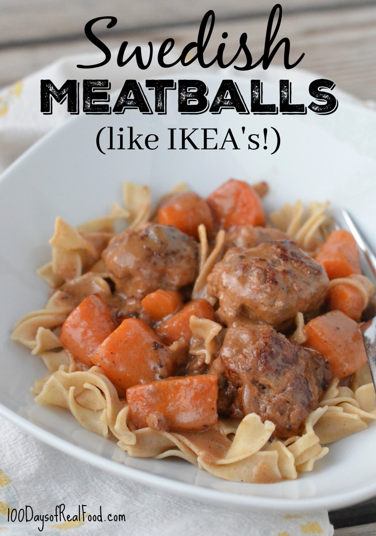 Large plate of meatballs, cooked carrots, and whole-wheat egg noodles topped with sauce.