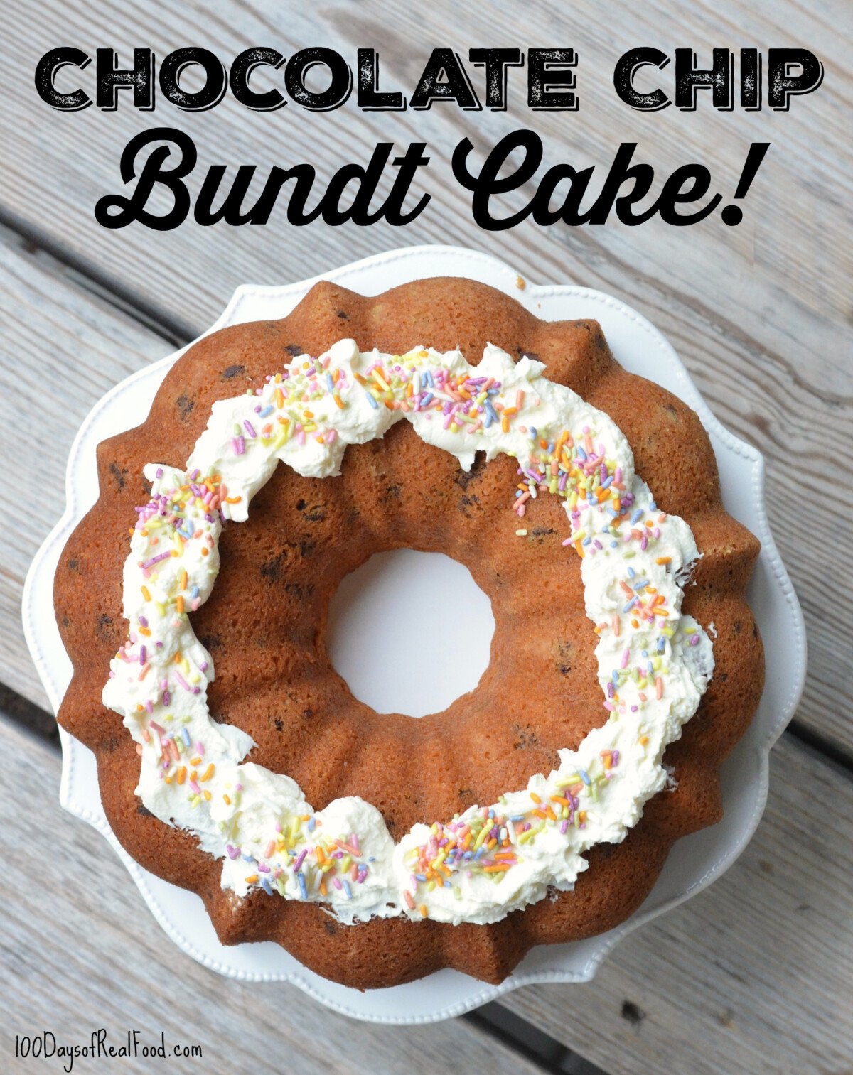 Chocolate Chip Bundt Cake topped with a ring of vanilla frosting and pastel colored sprinkles.
