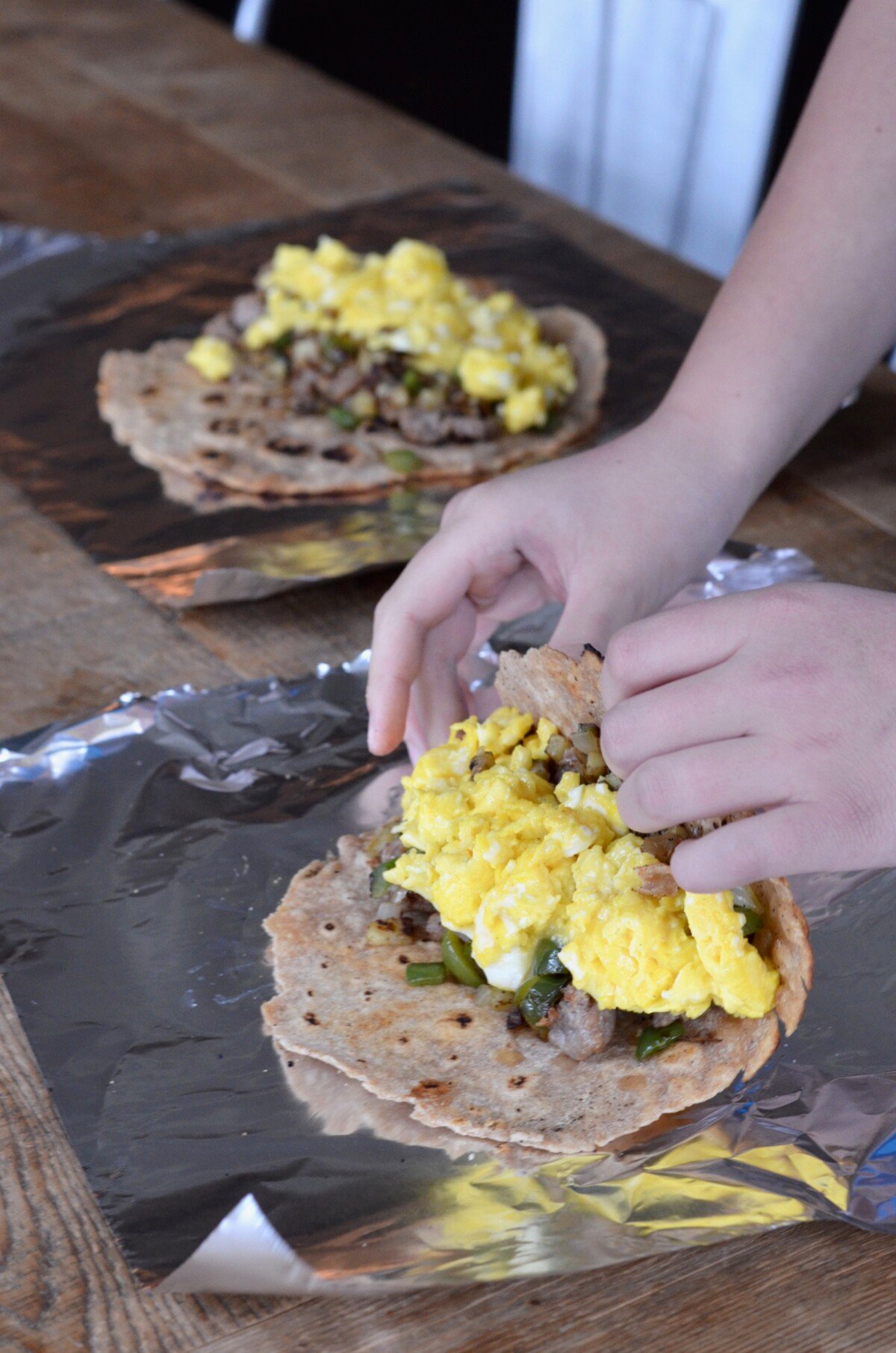 Prepping Easy Breakfast Burritos for the freezer.