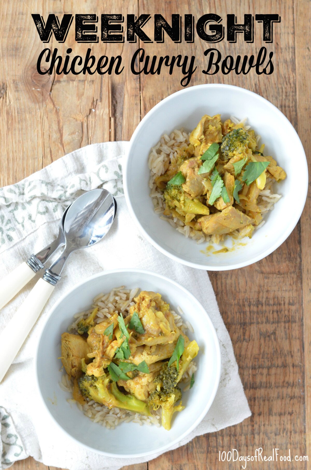 Two white bowls of Chicken Curry over brown rice and broccoli.