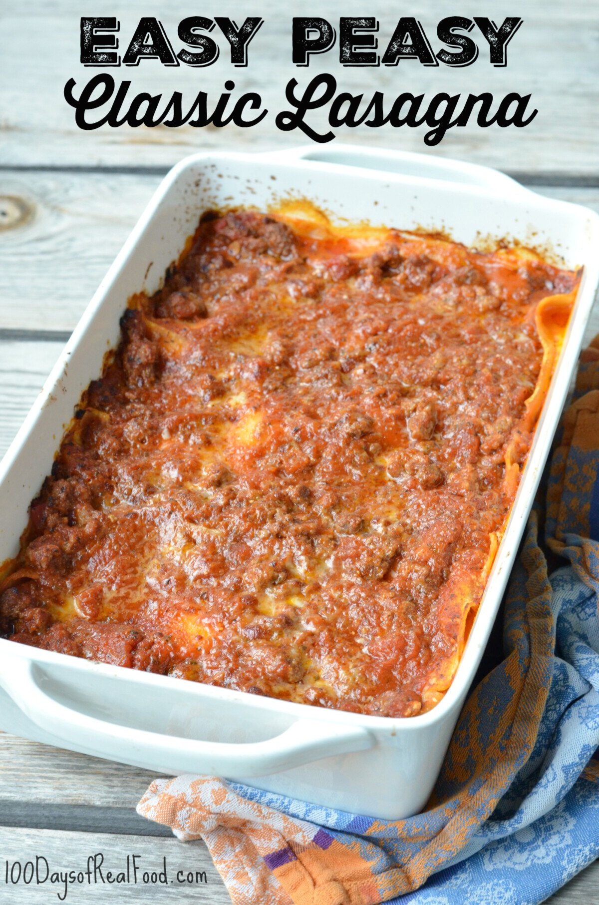 Homemade lasagna in a white baking dish