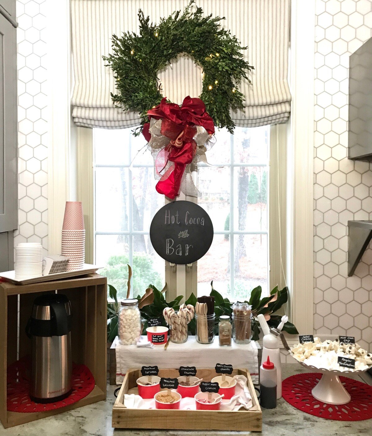 A homemade hot chocolate bar setup in the kitchen for the holidays.