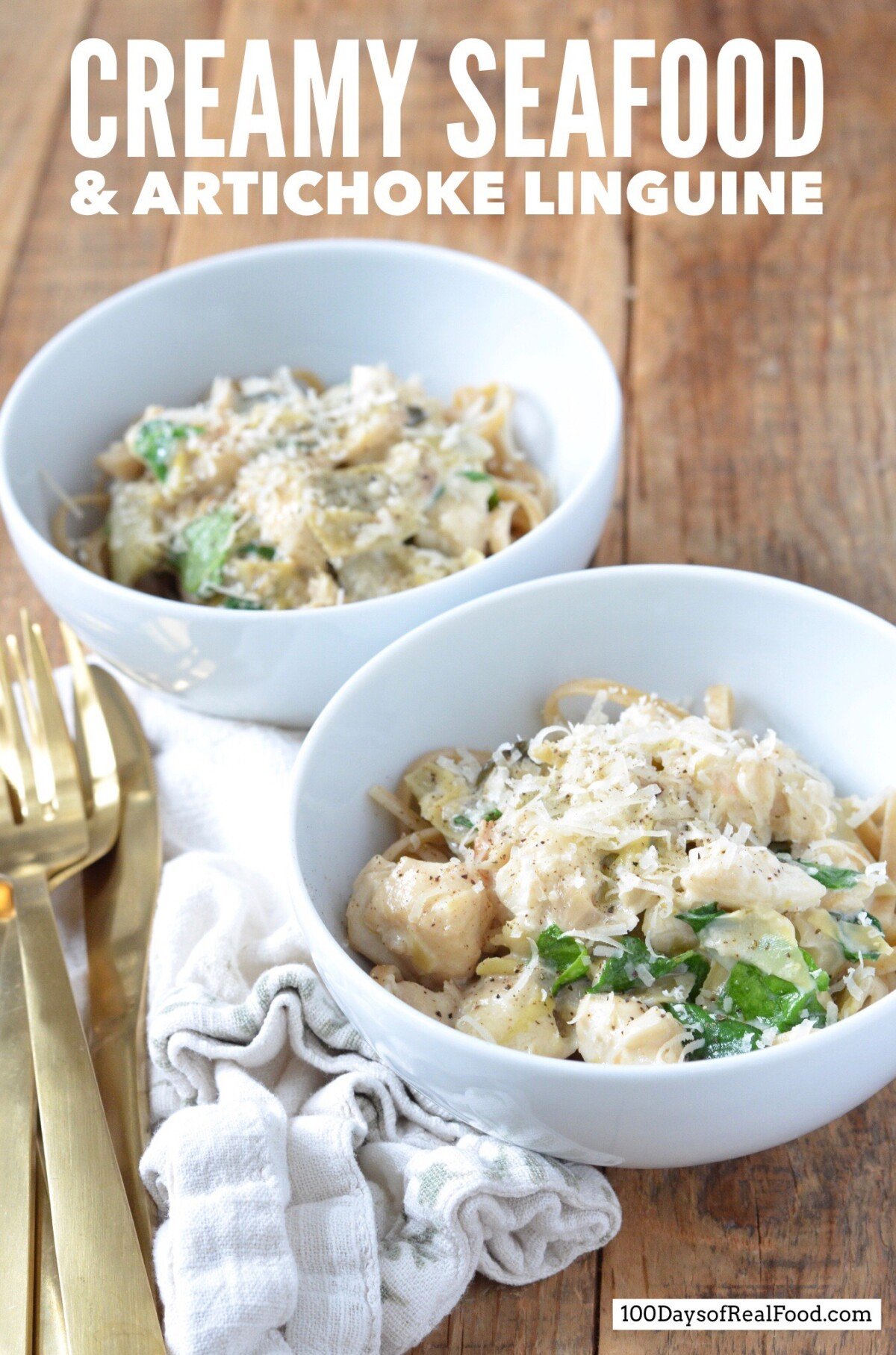 Creamy Seafood and Artichoke Linguine in two white bowls topped with grated cheese.