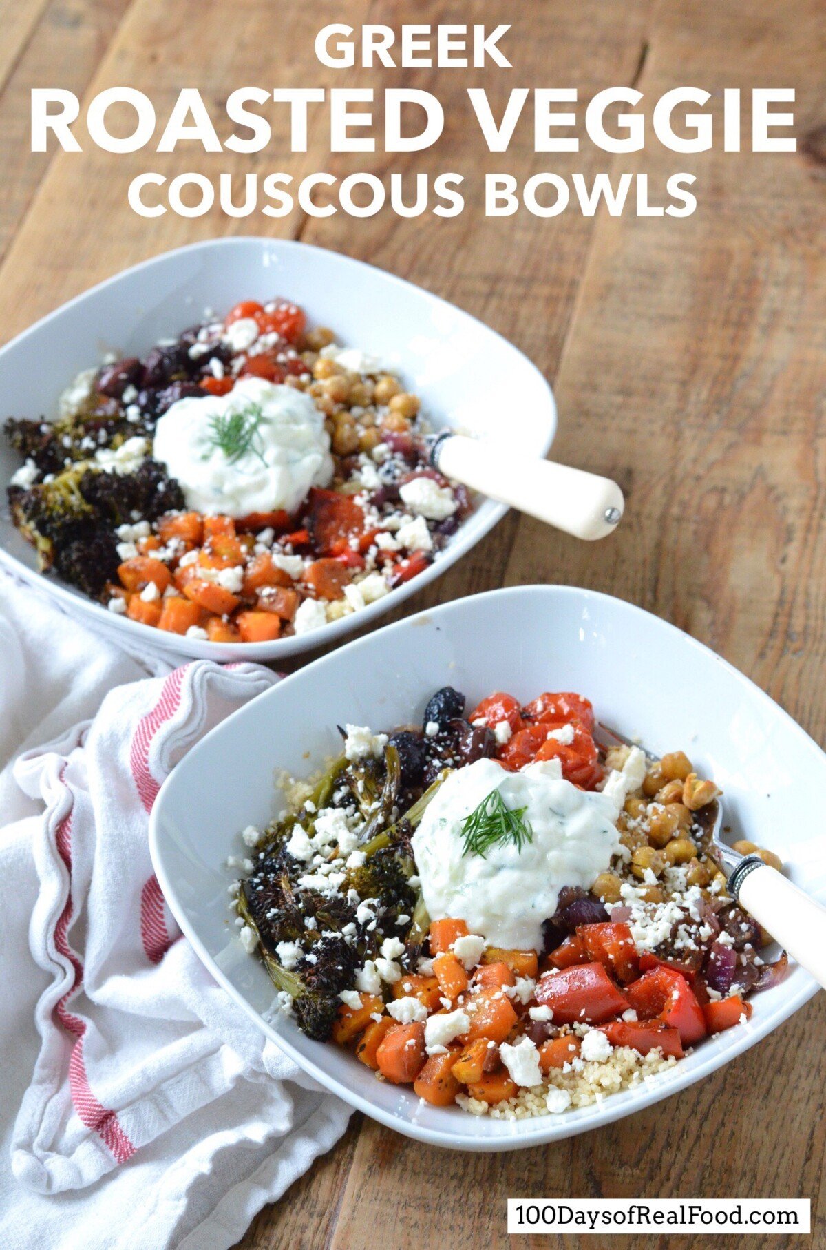 Two white bowls with Greek Roasted Veggie Couscous topped with feta cheese and a creamy white sauce.