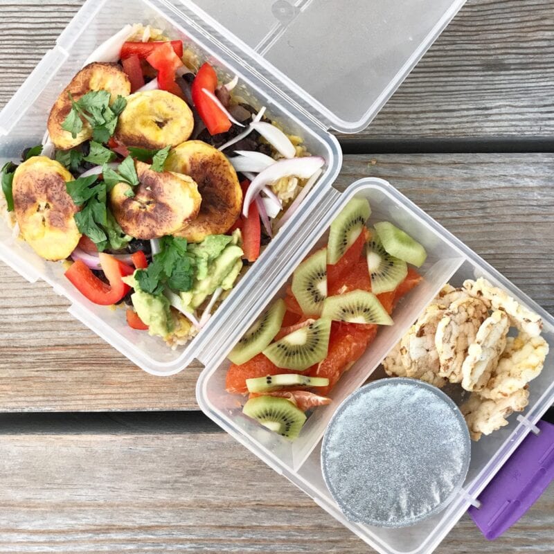 Lunchbox with Cuban yellow rice and black beans with roasted plantain