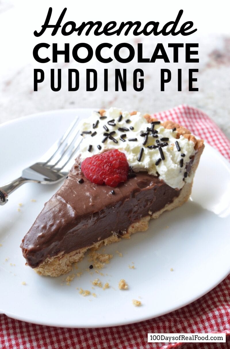  Chocolate pudding pie with raspberries, whipped cream and chocolate sprinkles.