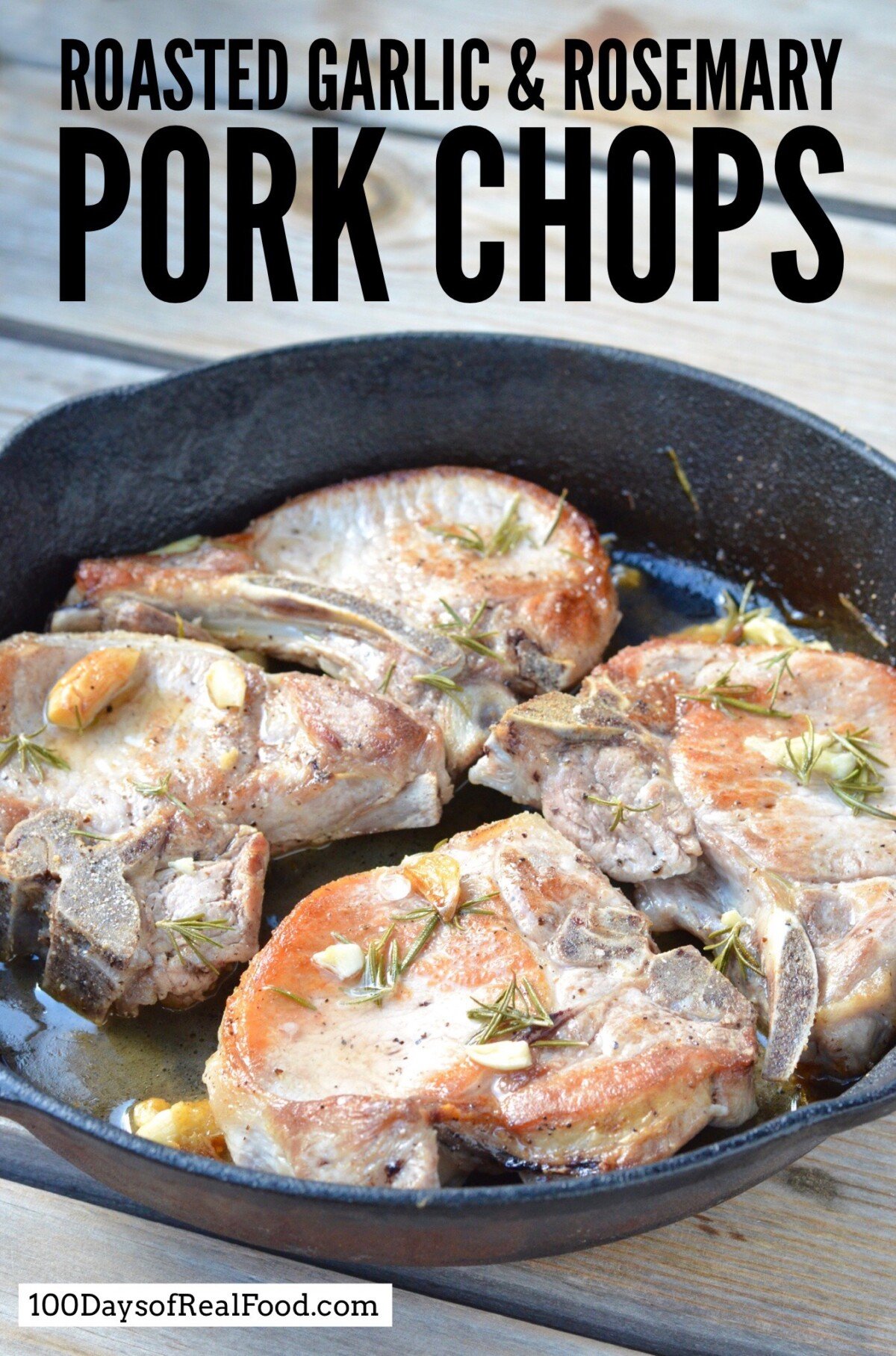 Roasted Garlic and Rosemary Pork Chops in a cast iron skillet.