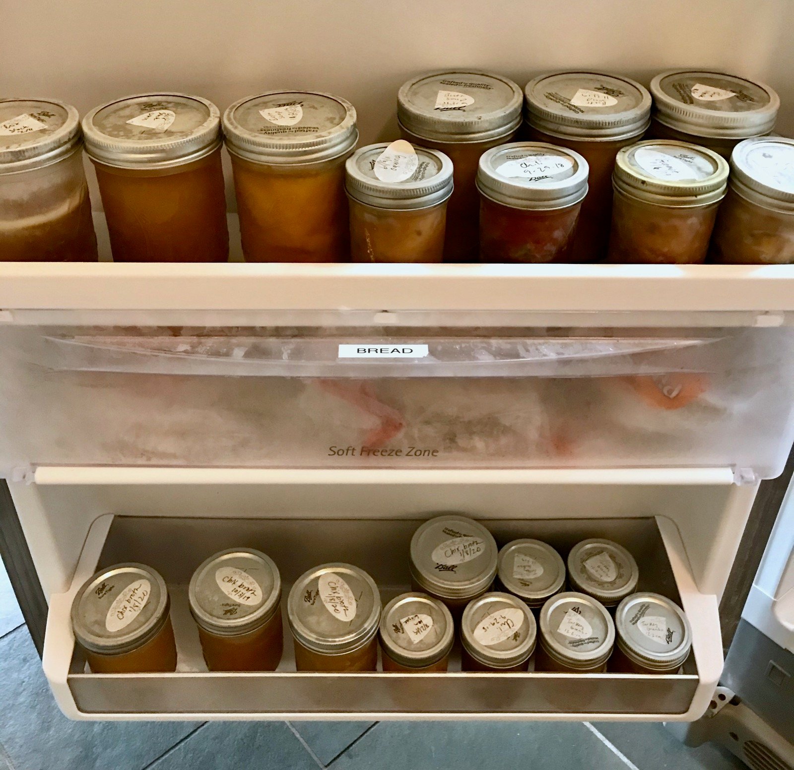 Frozen soup, broth, and bread in our freezer