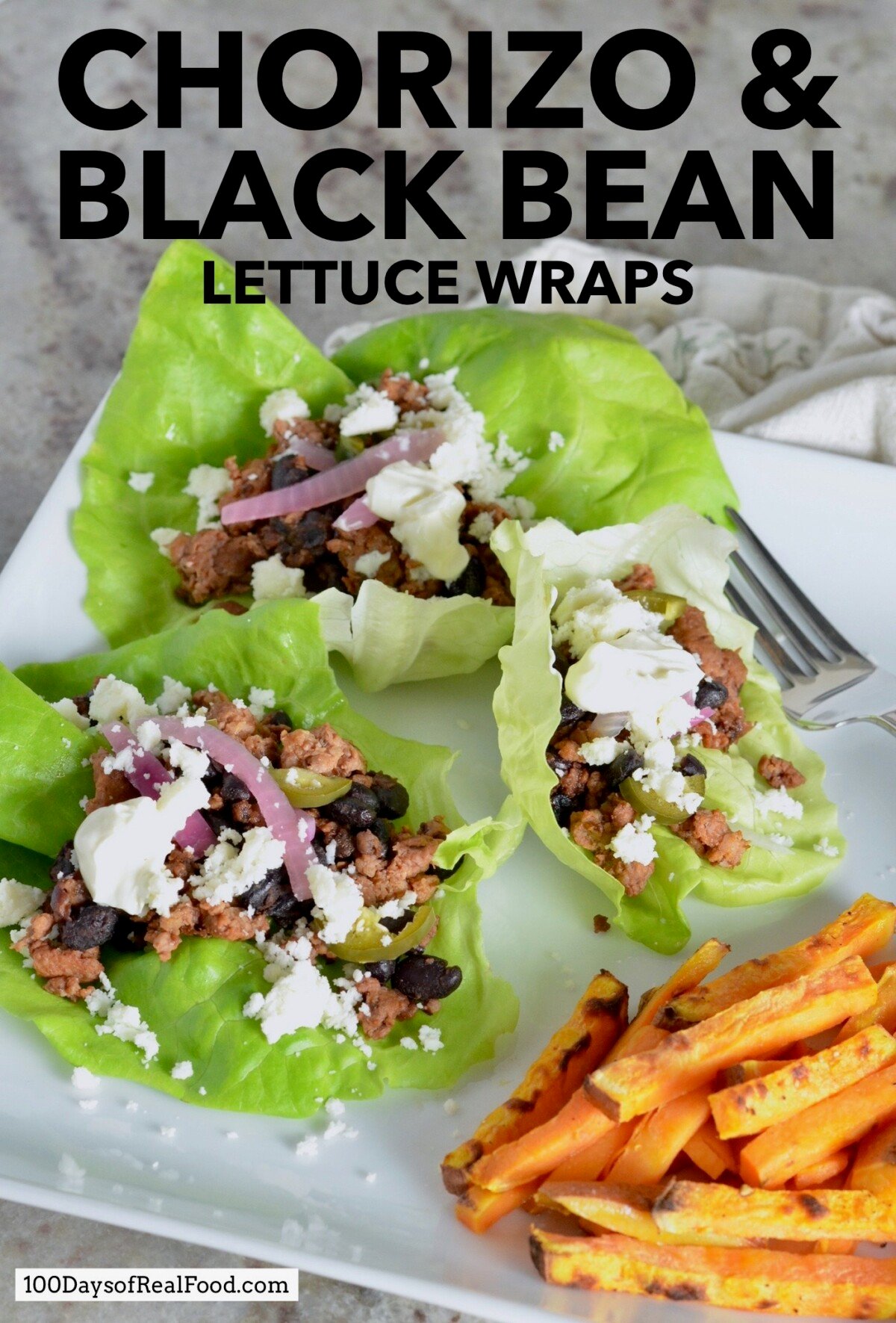 Three lettuce wraps with Chorizo ​​and Black Bean topped with crumbled cheese on a white dinner plate.