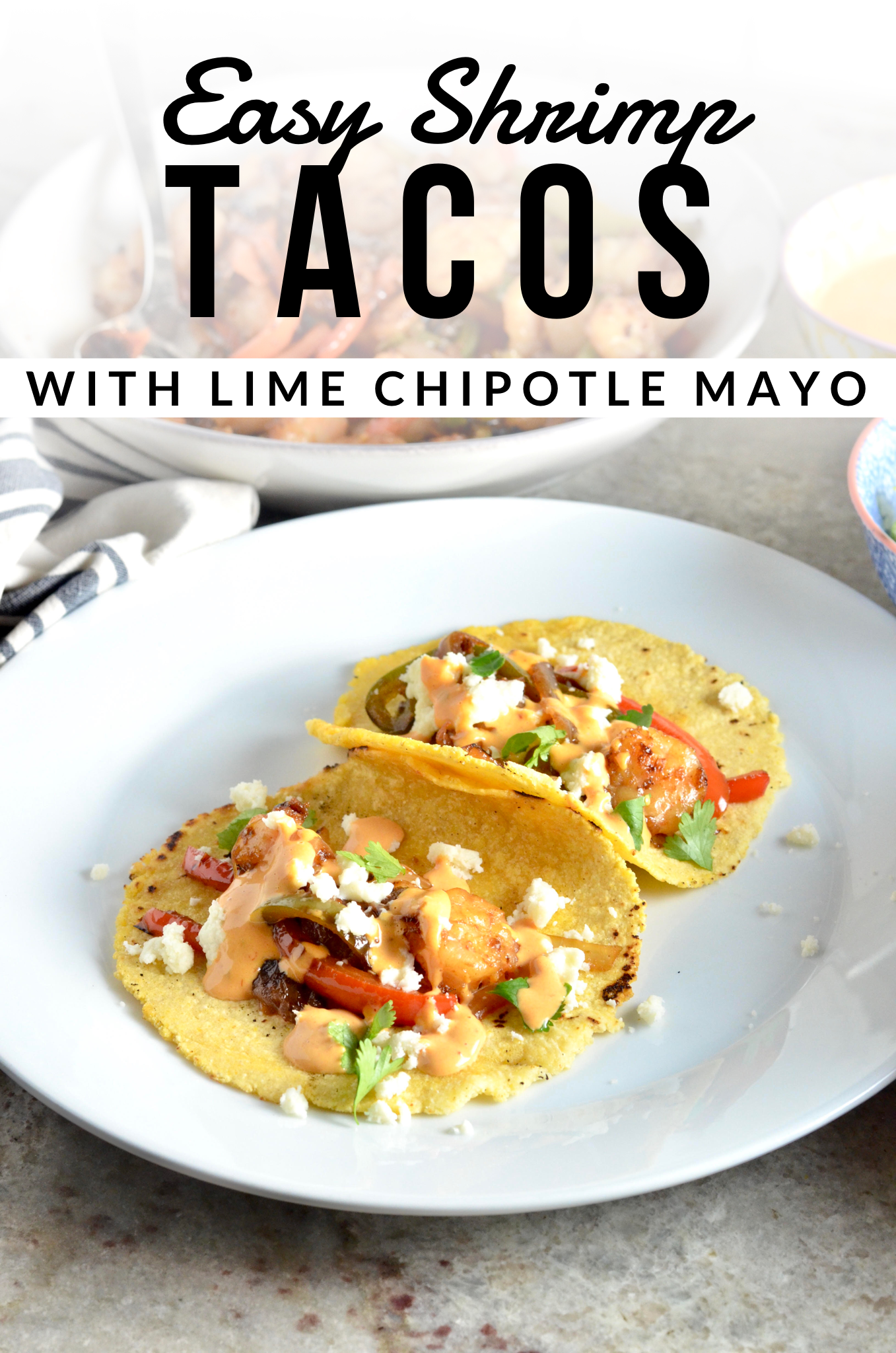 Two Shrimp Tacos on a white plate