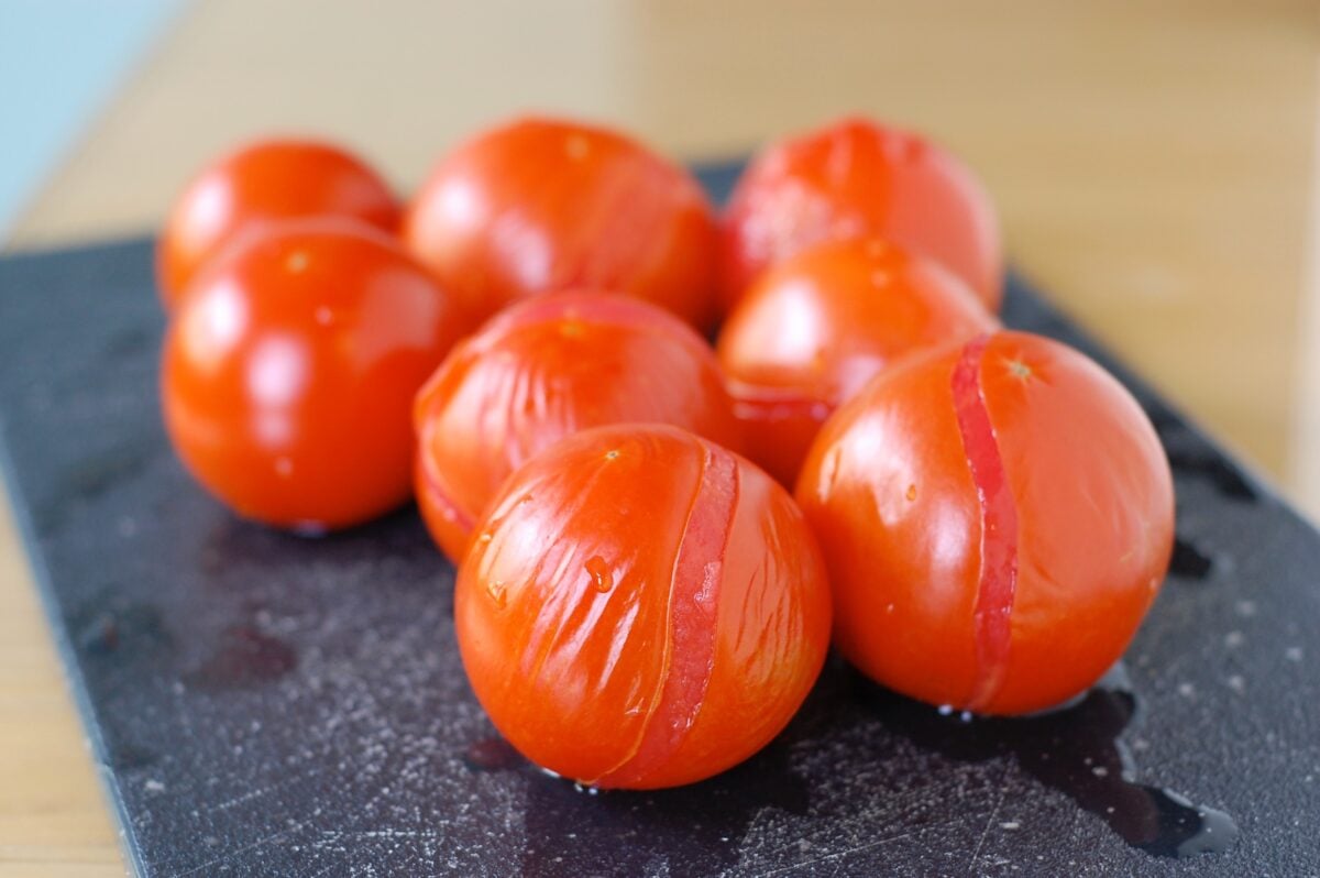 homegrown tomatoes on a cutting board