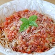 simple spaghetti with whole wheat noodles with basil