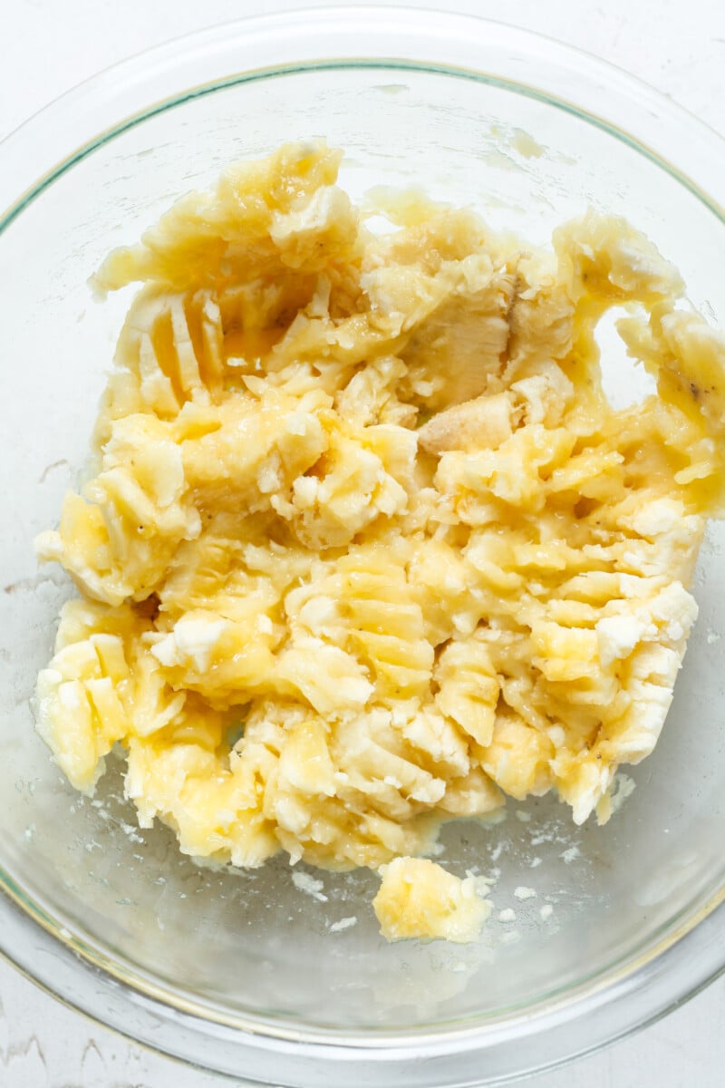 Mashed banana in bowl.