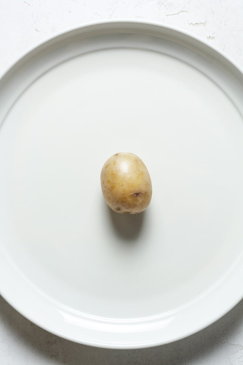 Baby potato on plate.
