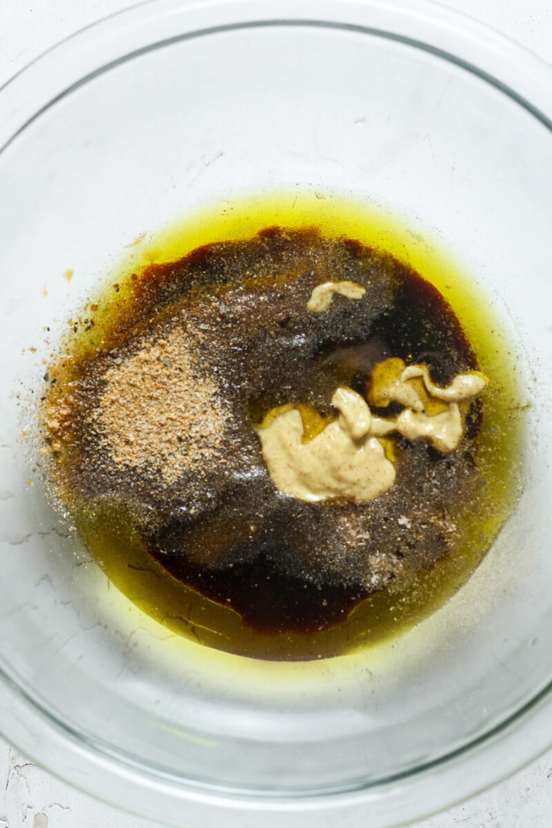 Oil, mustard and seasonings.