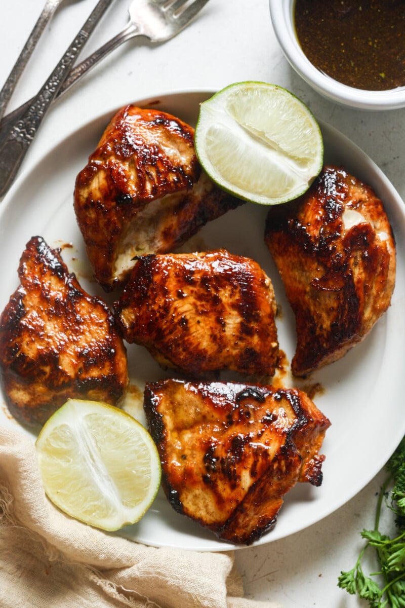 Chicken thighs with sauce.
