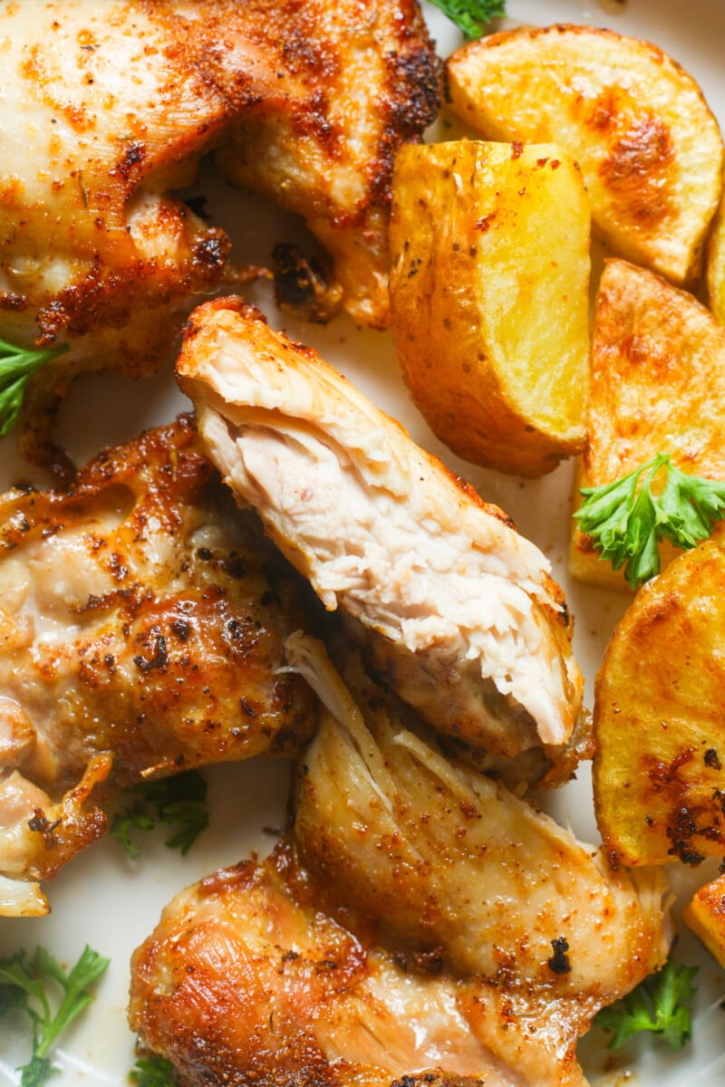 Meat with crispy potato wedges.