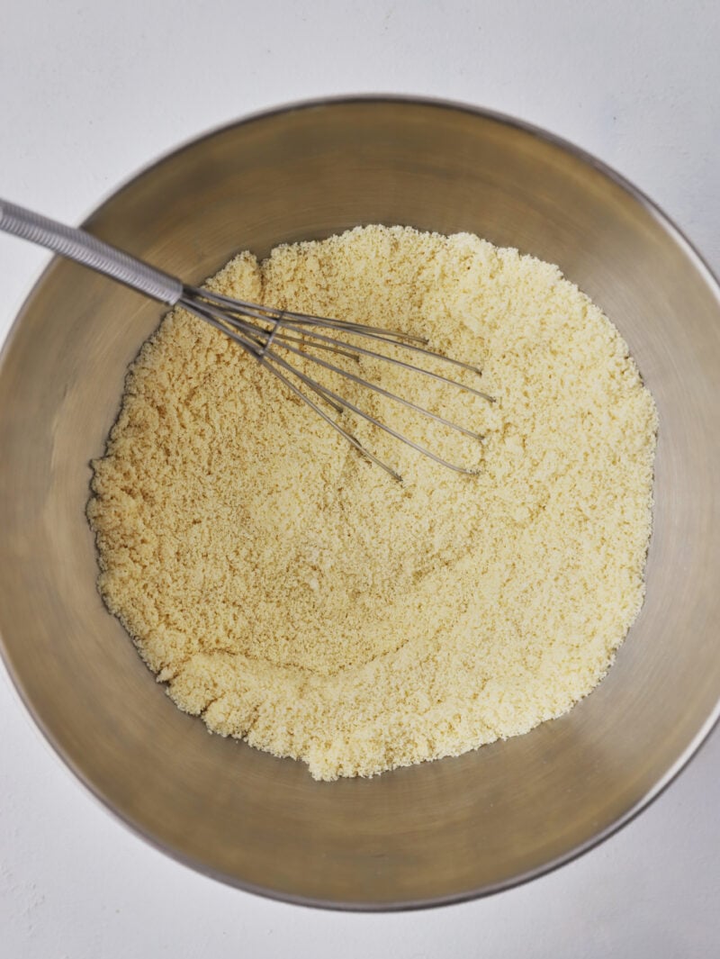 Almond flour with whisk.