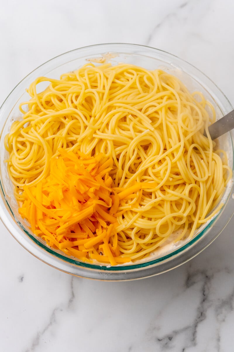 Pasta with shredded cheese.