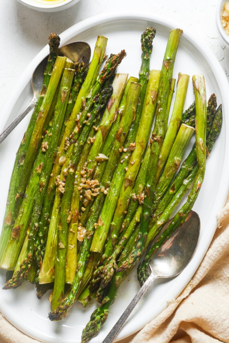 White plate with green veggie.