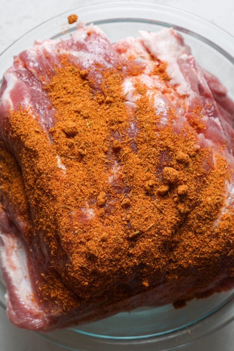 Pork butt with seasoning.