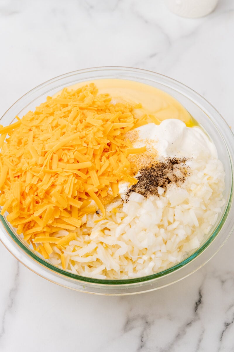 Cheese and sour cream in bowl.