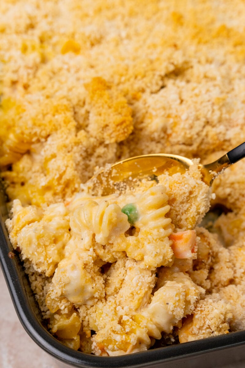 Chicken casserole with serving spoon.