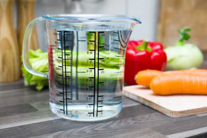 Water in milliliter cup.
