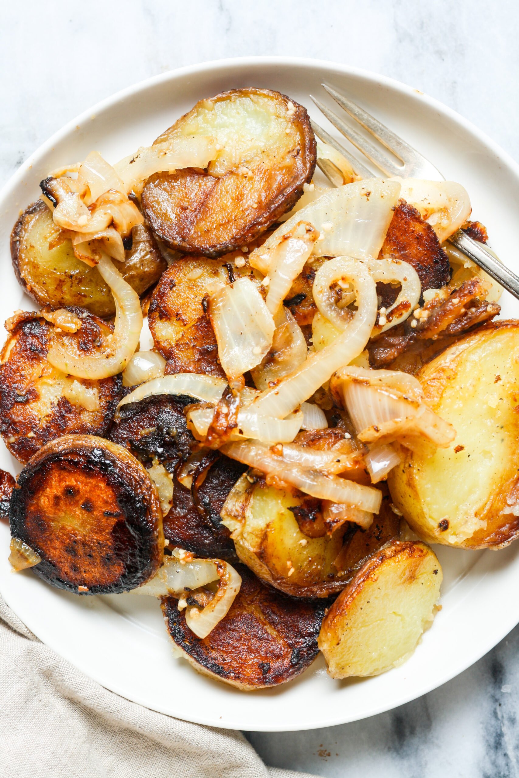 Plate of spuds with veggies.