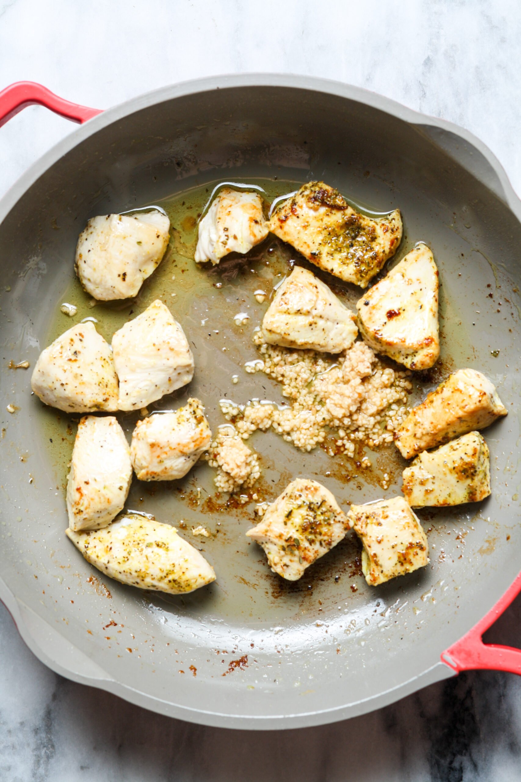 Garlic chicken in skillet.
