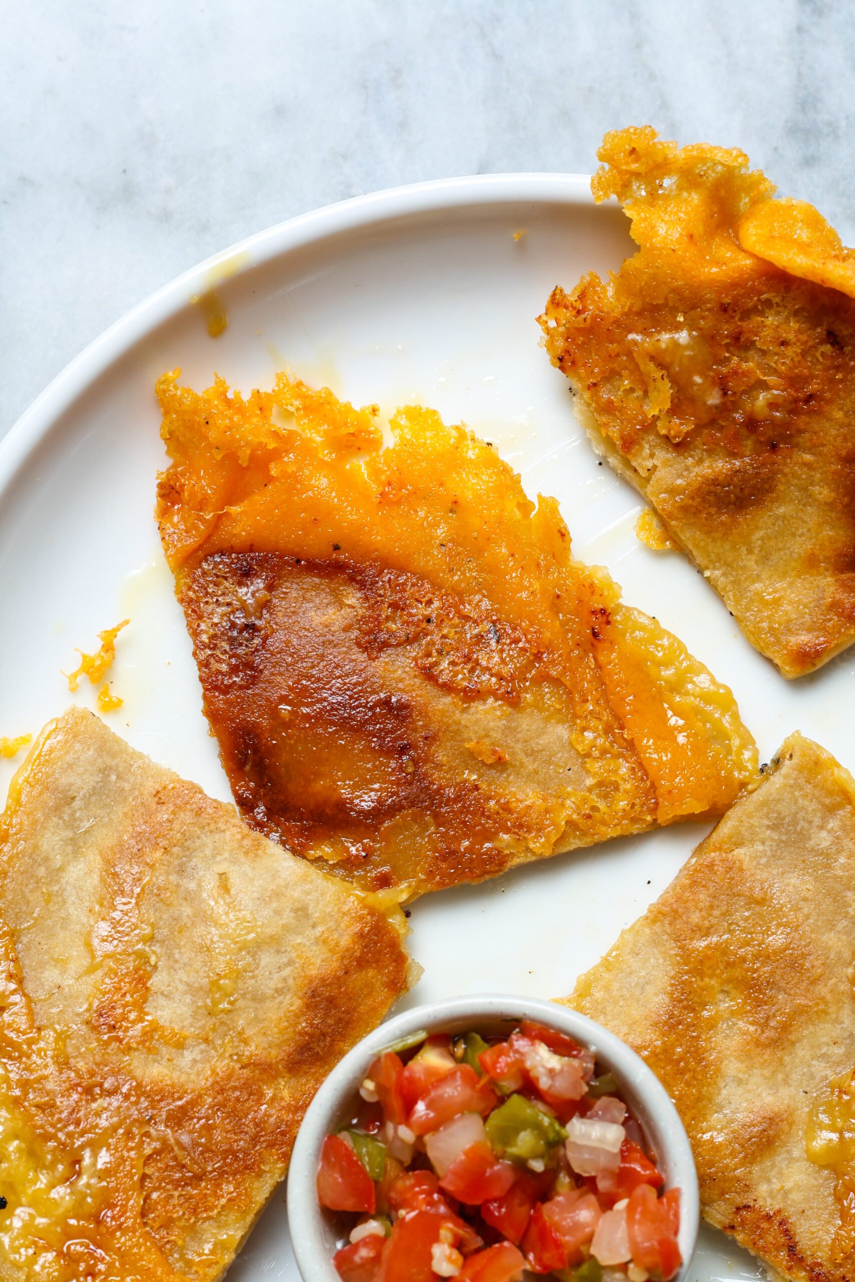 White plate with quesadilla.