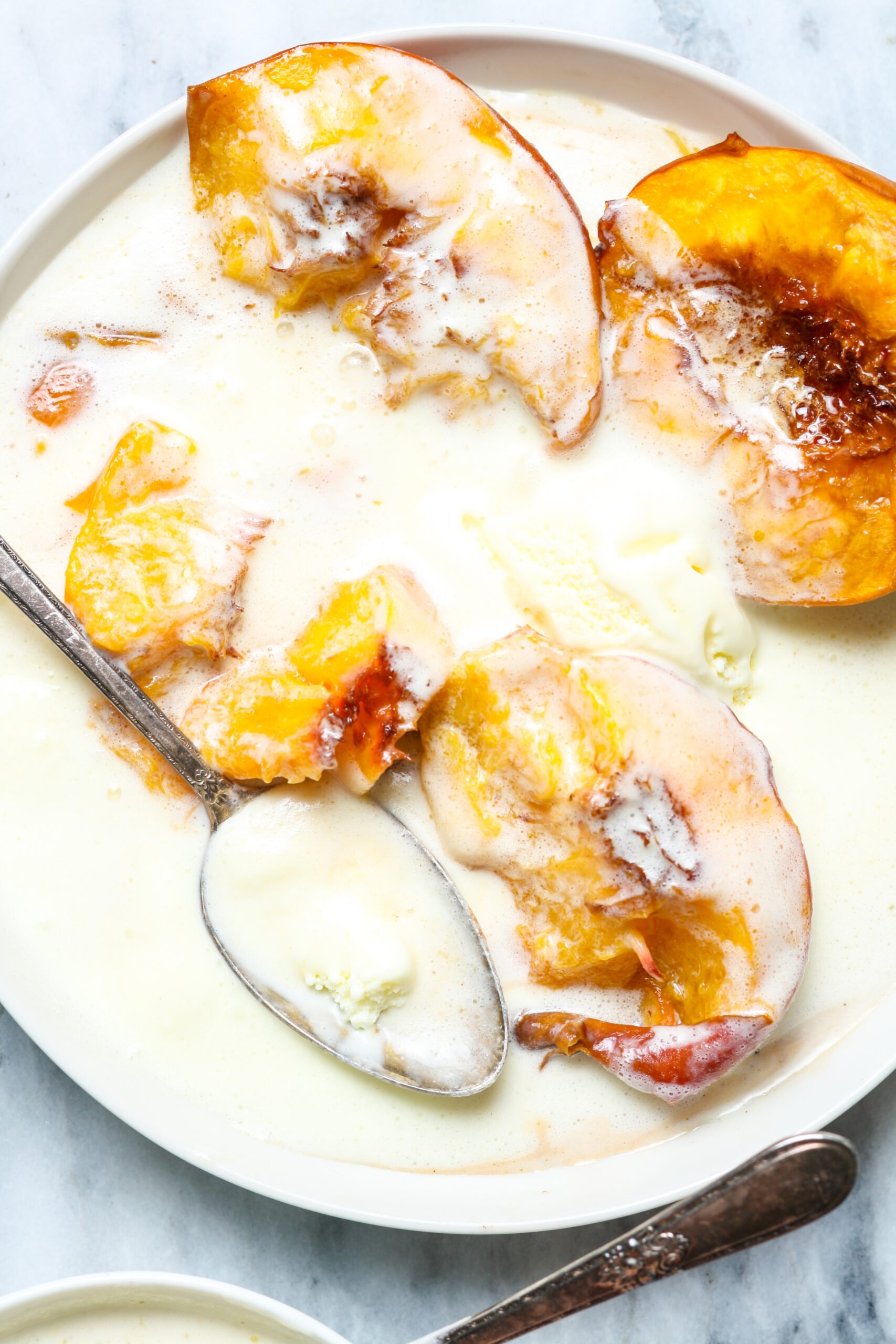 Fruit with vanilla ice cream.
